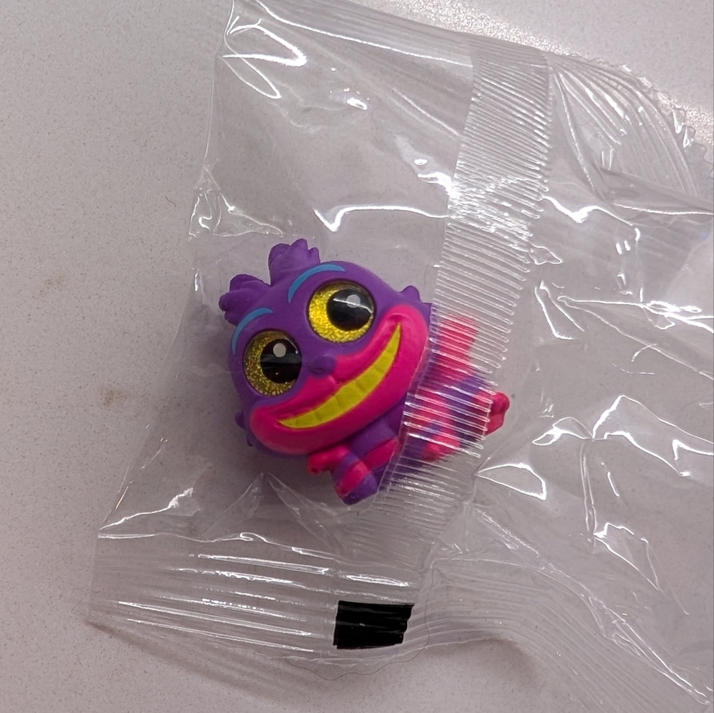 Disney Doorables Neon Cheshire Cat